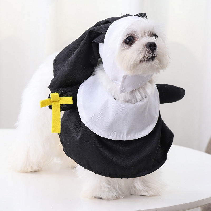 Dog wearing a nun costume with a yellow cross on a white background