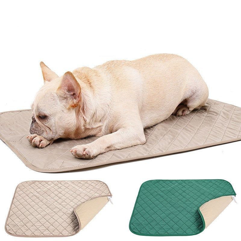 Dog lying on a quilted mat with additional mats shown below.