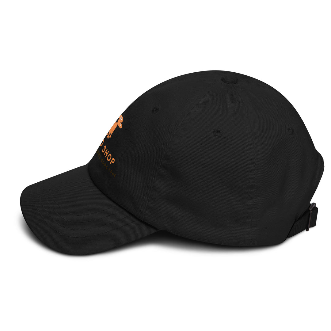 Black cap with doggo shop logo print on a white background