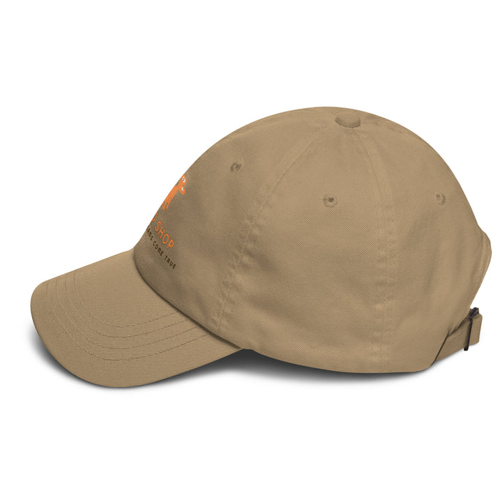 Brown cap with doggo shop logo on a white background
